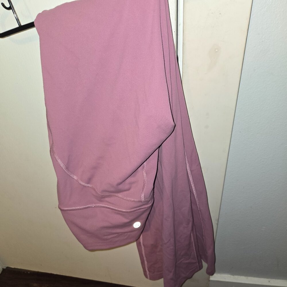 Lululemon Groove Flared Pant in a soft pink.